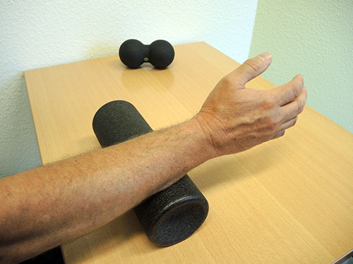 Hand-Armtraining mit einer Rolle
